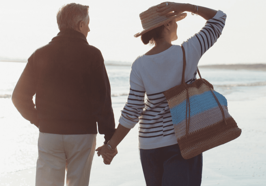 Retired couple on beach